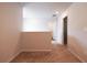 Hallway area with carpet floors and neutral colored walls and trim at 4700 Blake Loop, Atlanta, GA 30349