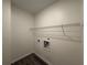 Laundry room with washer hookups and sleek flooring at 8620 Blair Ct, Douglasville, GA 30134