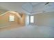 Spacious bedroom with neutral carpet and tray ceiling provides a blank canvas to personalize at 251 Waterford Cove Dr, Suwanee, GA 30024