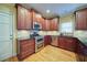 Updated kitchen with stainless appliances and granite countertops at 251 Waterford Cove Dr, Suwanee, GA 30024