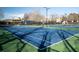 Well-maintained tennis courts, perfect for enjoying a match on a sunny day at 251 Waterford Cove Dr, Suwanee, GA 30024