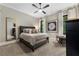 Calm bedroom with neutral tones and a comfortable bed with fluffy pillows at 3085 Lake Park Dr, Jonesboro, GA 30236