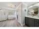 Bathroom featuring a soaking tub, a glass shower and wood-look floors at 2064 Democracy Dr, Buford, GA 30519