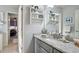 Bathroom with gray vanity and granite counters at 2064 Democracy Dr, Buford, GA 30519