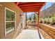 Back patio featuring a small amount of yard space with a retaining wall at 399 Skylar Se Way, Atlanta, GA 30315