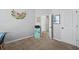 Bedroom featuring a mini fridge, doors, and a large light-filled window at 399 Skylar Se Way, Atlanta, GA 30315