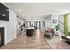 Open concept living room with an island kitchen and a cozy fireplace at 399 Skylar Se Way, Atlanta, GA 30315