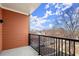 Enjoy outdoor living on this balcony with views of the surrounding trees and skyline at 525 Parkway Dr Ne # 203, Atlanta, GA 30354