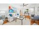 Comfortable living room showcasing contemporary art, hardwood floors, and modern seating at 1523 Vancouver Dr, Tucker, GA 30084