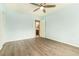 Spacious bedroom offers laminate flooring, a ceiling fan, and lots of natural light at 2302 Abner Nw Pl, Atlanta, GA 30318