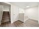 Finished basement area with stairs and a bright ceiling light at 3385 Lyndale St, Douglasville, GA 30135