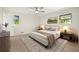 Bedroom featuring a modern bed, natural light, and neutral color palette at 3385 Lyndale St, Douglasville, GA 30135