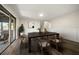 Dining room featuring modern table, decor, hardwood floors, and slider doors at 3385 Lyndale St, Douglasville, GA 30135