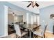 Transitional dining room shows seamless flow into the living room and the kitchen at 599 Jefferson Chase St, Atlanta, GA 30354