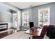 Office and entryway featuring hardwood floors, natural light, and neutral paint at 599 Jefferson Chase St, Atlanta, GA 30354