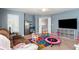 Spacious playroom with entertainment area and -friendly decor at 599 Jefferson Chase St, Atlanta, GA 30354