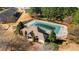 Aerial image of a community pool house with a covered pool surrounded by trees at 599 Jefferson Chase St, Atlanta, GA 30354