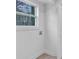 Laundry room with white walls and flooring at 125 Glenrose Sw Cir, Atlanta, GA 30354