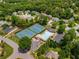 Aerial view of the neighborhood pool and tennis courts at 565 Ashvale Overlook, Alpharetta, GA 30005