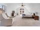 Bright main bedroom featuring vaulted ceiling, large window and neutral finishes at 565 Ashvale Overlook, Alpharetta, GA 30005