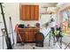 Functional shed space with storage, wooden cabinets, and a window for natural light at 565 Ashvale Overlook, Alpharetta, GA 30005