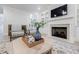 Cozy living room features a fireplace and built-in shelving at 783 Phil Haven Ln, Kennesaw, GA 30152