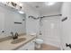 Bathroom featuring a single sink vanity with a large mirror and a shower-tub combination at 1004 Masons Creek Cir # 1004, Atlanta, GA 30350