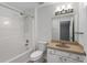 Bright bathroom with a shower-tub combination and a single sink vanity at 1004 Masons Creek Cir # 1004, Atlanta, GA 30350