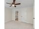 Carpeted bedroom with an en-suite bathroom at 1004 Masons Creek Cir # 1004, Atlanta, GA 30350