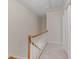 Upstairs hallway with carpet floors and white trim at 1004 Masons Creek Cir # 1004, Atlanta, GA 30350