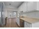 Kitchen featuring stainless steel appliances and countertops, with a door leading to the patio at 1004 Masons Creek Cir # 1004, Atlanta, GA 30350
