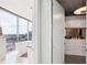 Bright bathroom with a large window, soaking tub, and modern fixtures at 1065 Peachtree Ne St # 3005, Atlanta, GA 30309