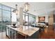 Open-concept kitchen featuring granite countertops and stainless steel appliances at 1065 Peachtree Ne St # 3005, Atlanta, GA 30309
