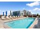 Rooftop pool deck with lounge chairs and city views at 1065 Peachtree Ne St # 3005, Atlanta, GA 30309