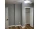 Bedroom with hardwood floors and a closet with a bifold door at 1140 Smith Sw St, Atlanta, GA 30310