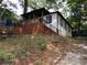 Exterior of the house with a back deck, showcasing the backyard area at 1140 Smith Sw St, Atlanta, GA 30310
