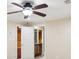 Bedroom view featuring ceiling fan and bathroom with cabinets at 6030 Chimney Springs Rd, Buford, GA 30518