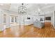 Open-concept space with seamless transitions between the kitchen, dining, and sunroom areas at 6030 Chimney Springs Rd, Buford, GA 30518