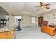 Large bedroom featuring an exercise machine, a ceiling fan, and ample natural light at 150 Hillred Dr, Fayetteville, GA 30215