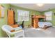 Cozy bedroom with a bunk bed, desk, and natural light at 150 Hillred Dr, Fayetteville, GA 30215