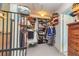 Walk-in closet features shelving and hanging racks at 150 Hillred Dr, Fayetteville, GA 30215