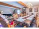 Spacious dining room featuring a large table, chandelier, and hardwood floors, great for entertaining guests at 150 Hillred Dr, Fayetteville, GA 30215