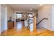 Second-floor landing with hardwood flooring and staircase at 150 Hillred Dr, Fayetteville, GA 30215