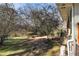 Large backyard featuring mature trees and a natural landscape at 2100 Shady Ln, Tucker, GA 30084
