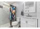 Bathroom featuring walk in shower, neutral finishes, and a modern vanity at 2100 Shady Ln, Tucker, GA 30084