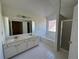 Clean bathroom featuring a shower and bathtub combo at 2979 Belfaire Crest Ct, Dacula, GA 30019