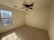 Bedroom with neutral carpet and a ceiling fan at 2979 Belfaire Crest Ct, Dacula, GA 30019