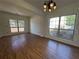 Bright dining room featuring hardwood floors and large windows at 2979 Belfaire Crest Ct, Dacula, GA 30019