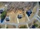 Aerial view of neighborhood with single-Gathering homes and neatly arranged lawns and landscaping at 50 Crabapple Ridge Dr, Oxford, GA 30054