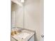 Bathroom featuring a granite countertop and a framed mirror at 50 Crabapple Ridge Dr, Oxford, GA 30054